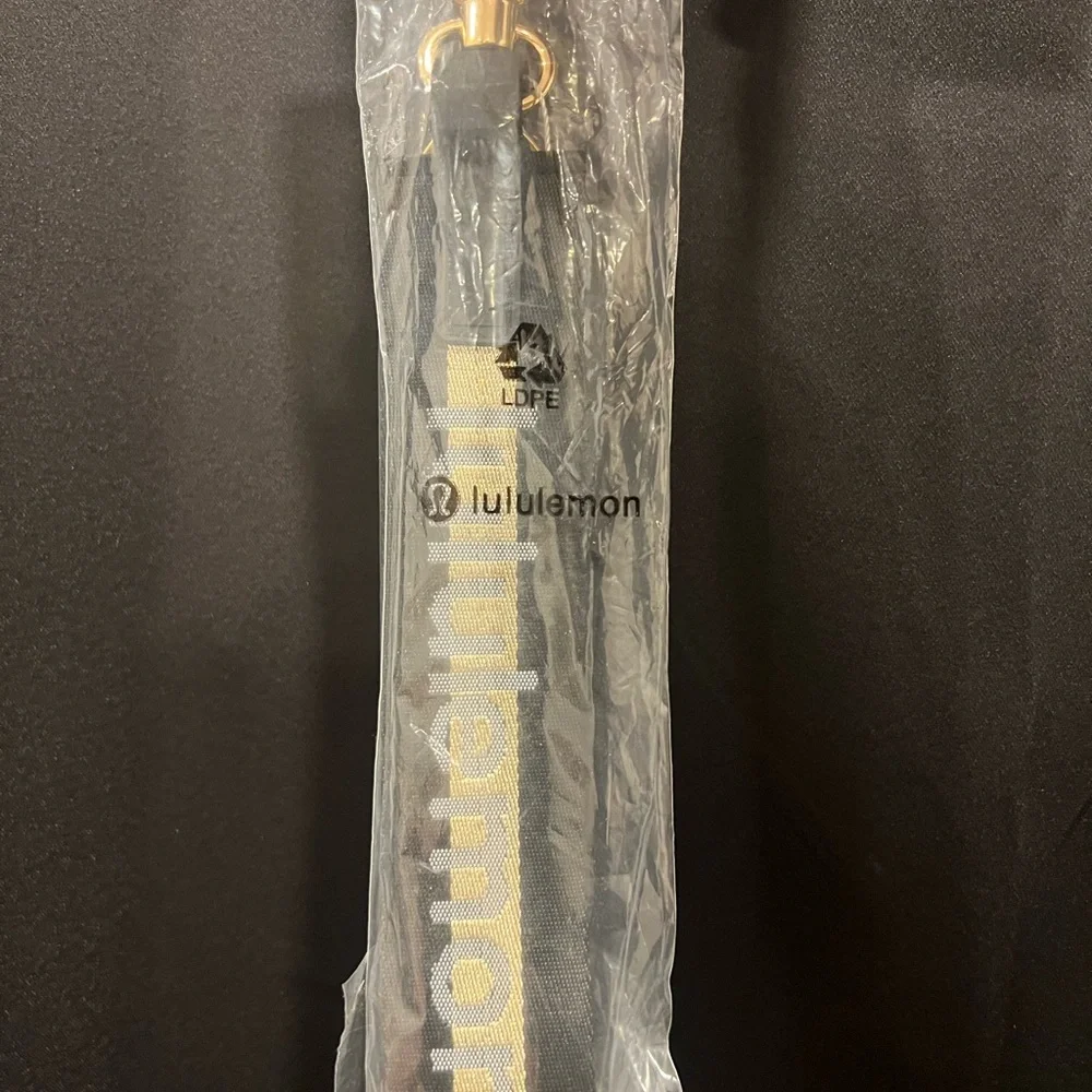 Lululemon Black and Gold Keychain